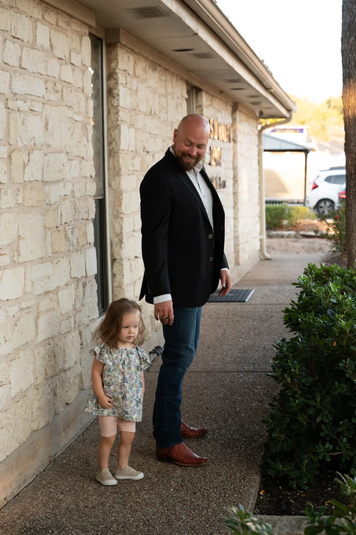 Dr. Hauser with his daughter at the practice